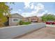 Brick front exterior with landscaping and driveway at 515 W Romley Ave, Phoenix, AZ 85041