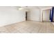 Bright bedroom with tile flooring and ceiling fan at 515 W Romley Ave, Phoenix, AZ 85041