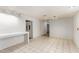 Kitchen with light wood cabinets and tile floor at 515 W Romley Ave, Phoenix, AZ 85041