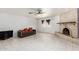 Living room with fireplace and tile flooring at 515 W Romley Ave, Phoenix, AZ 85041