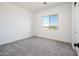 Bright bedroom with carpet flooring and window at 115 E Santa Cruz Dr, Phoenix, AZ 85085