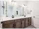 Modern bathroom with double vanity and a bathtub at 115 E Santa Cruz Dr, Phoenix, AZ 85085