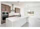 Modern kitchen with stainless steel appliances and an island at 115 E Santa Cruz Dr, Phoenix, AZ 85085