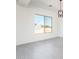 Dining room with large window offering views of the desert landscape at 115 E Santa Cruz Dr, Phoenix, AZ 85085