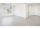 Spacious dining area with tile floors and access to entryway at 115 E Santa Cruz Dr, Phoenix, AZ 85085