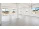 Spacious dining area with large windows and tile floors at 115 E Santa Cruz Dr, Phoenix, AZ 85085