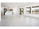 Modern kitchen with island, wood cabinets, and stainless steel appliances at 115 E Santa Cruz Dr, Phoenix, AZ 85085