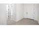 Bright and airy entryway with tile flooring and neutral walls at 115 E Santa Cruz Dr, Phoenix, AZ 85085