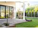 Relaxing patio with hanging chairs and lush landscaping at 6836 N 13Th Pl # B, Phoenix, AZ 85014