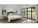 Bright bedroom with sliding glass doors opening to backyard at 6836 N 13Th Pl # B, Phoenix, AZ 85014