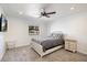 Bright bedroom with a ceiling fan and large window at 7211 E Sunnyside Dr, Scottsdale, AZ 85260