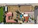 Aerial view of a large estate with stables, riding arena, and pool at 7211 E Sunnyside Dr, Scottsdale, AZ 85260