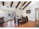 Bright dining area with terracotta floors and access to the backyard at 7211 E Sunnyside Dr, Scottsdale, AZ 85260