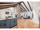 Island kitchen with granite countertops and open views to Gathering room at 7211 E Sunnyside Dr, Scottsdale, AZ 85260