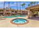 Relaxing community pool and spa area with patio seating at 930 N Mesa Dr # 2037, Mesa, AZ 85201