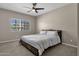 Spacious bedroom with large window and ceiling fan at 930 N Mesa Dr # 2037, Mesa, AZ 85201