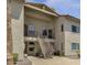 Two story condo building with stairway access to unit at 930 N Mesa Dr # 2037, Mesa, AZ 85201