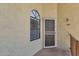 Condo entrance with security door and window at 930 N Mesa Dr # 2037, Mesa, AZ 85201