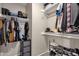Walk-in closet with shelving and hanging rods at 930 N Mesa Dr # 2037, Mesa, AZ 85201