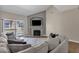 Living room with vaulted ceilings, fireplace and comfy seating at 930 N Mesa Dr # 2037, Mesa, AZ 85201