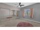 Bedroom with mirrored closet doors and rug at 930 N Mesa Dr # 2037, Mesa, AZ 85201