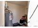 Indoor storage room with water heater and shelving for extra storage space at 930 N Mesa Dr # 2037, Mesa, AZ 85201
