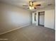 Spacious bedroom with carpet and large closet at 5420 W Albeniz Pl, Phoenix, AZ 85043