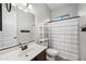 Bathroom with shower/tub combo, vanity with sink, and a white striped curtain at 6202 E Mckellips Rd # 310, Mesa, AZ 85215