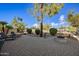 Relaxing backyard oasis with patio, fire pit, and lush landscaping at 6202 E Mckellips Rd # 310, Mesa, AZ 85215