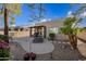 Spacious backyard with patio, fire pit, and lounge chairs at 6202 E Mckellips Rd # 310, Mesa, AZ 85215