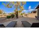 Backyard patio with lounge chairs and fire pit, great for entertaining at 6202 E Mckellips Rd # 310, Mesa, AZ 85215
