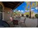 Covered patio with table and chairs, perfect for outdoor dining at 6202 E Mckellips Rd # 310, Mesa, AZ 85215