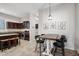 Eat in kitchen with island and rustic wood dining table at 6202 E Mckellips Rd # 310, Mesa, AZ 85215