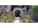 Inviting entryway with gated access to the community at 7027 N Scottsdale Rd # 237, Scottsdale, AZ 85253