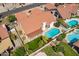 Aerial view of a house with a pool and landscaped backyard at 13355 N 100Th Pl, Scottsdale, AZ 85260