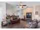 Living room with hardwood floors and views to dining area and entry at 13355 N 100Th Pl, Scottsdale, AZ 85260