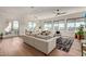 Spacious living area with hardwood floors and access to balcony at 6166 N Scottsdale Rd # C3006, Paradise Valley, AZ 85253