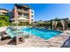 Inviting community pool with lounge chairs and umbrellas at 6166 N Scottsdale Rd # C3006, Paradise Valley, AZ 85253