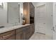 Elegant bathroom with marble countertop and built-in storage at 6166 N Scottsdale Rd # C3006, Paradise Valley, AZ 85253
