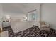 Bright bedroom featuring a comfortable bed and a view at 6166 N Scottsdale Rd # C3006, Paradise Valley, AZ 85253