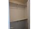 Simple closet with hanging rods and a shelf at 15151 N 100Th Way, Scottsdale, AZ 85260