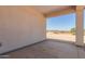 Covered patio with view of the desert landscape at 11246 S 219Th Ln, Buckeye, AZ 85326