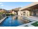 Luxury pool with patio, water features, and mountain views at 24892 N 107Th St, Scottsdale, AZ 85255