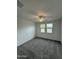 Spacious bedroom with ceiling fan and carpet flooring at 24066 N 162Nd Ln, Surprise, AZ 85387