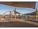Rope climbing feature and shaded play area at 24066 N 162Nd Ln, Surprise, AZ 85387