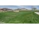 Expansive grassy area perfect for relaxing at 24066 N 162Nd Ln, Surprise, AZ 85387