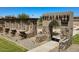 Elegant community entrance with stone archway at 24066 N 162Nd Ln, Surprise, AZ 85387
