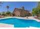 Inviting backyard pool with grassy area and patio at 6325 E Monte Cristo Ave, Scottsdale, AZ 85254
