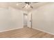 Charming bedroom with ceiling fan and access to hallway at 6325 E Monte Cristo Ave, Scottsdale, AZ 85254