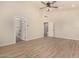 Well-lit main bedroom with ceiling fan and access to bathroom at 6325 E Monte Cristo Ave, Scottsdale, AZ 85254